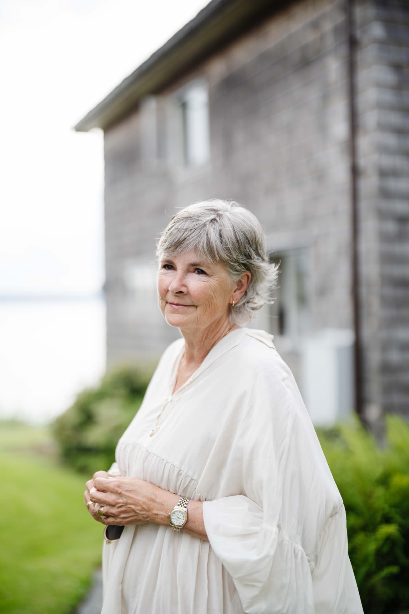 Portrait of Birgitta Svensson, founder and maker of One Bi One, outdoors by the sea in Western Sweden