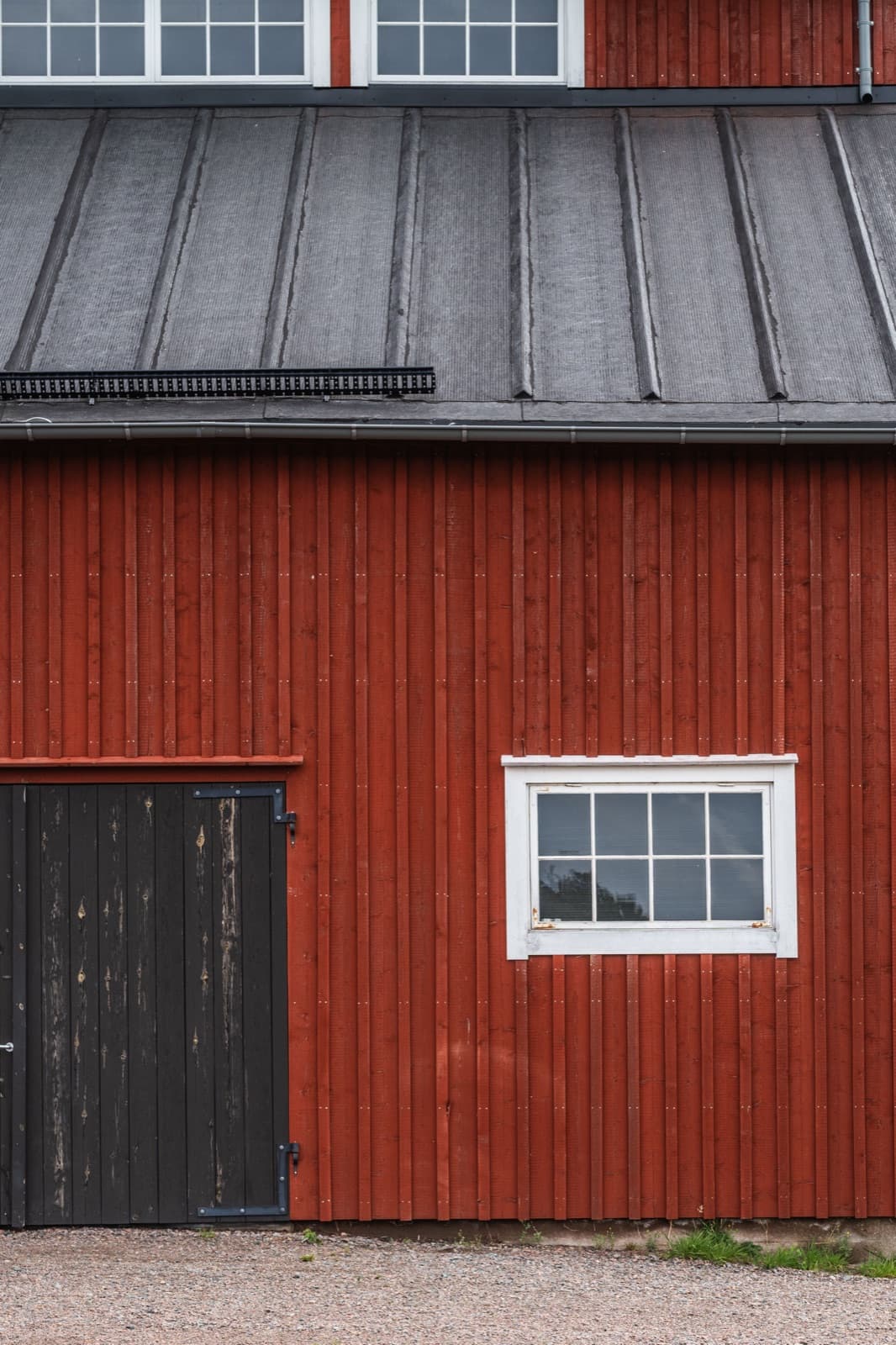 The red timber barn housing Godsmagasinet antiques shop on the road to Tjolöholm
